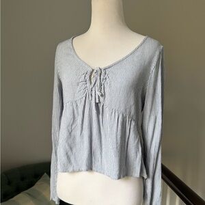 Hollister Blue and white striped long sleeve top with tie front detail 
Size XS